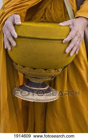 Detail Of Monk With His Alms Bowl View Large Photo Image Stock Photo - Detail Of Monk With His Alms Bowl. Fotosearch