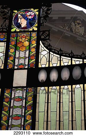 Stock Image - Detail of stained glass adorning the exterior of the Art Nouveau - Obecni dum building (The Municipal House), Prague, Czech Republic, Europe. Fotosearch