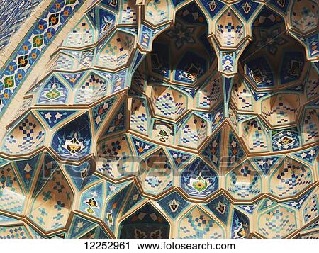 Stock Image - Detail of stalactite decoration, entrance iwan, Gur Emir (tomb of Timur); Samarkand, Uzbekistan. Fotosearch