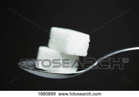 Detail Of Sugar Cubes On Spoon View Large Photo Image Stock Photo - Detail Of Sugar Cubes On Spoon. Fotosearch