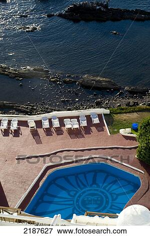 Stock Photo - Detail Of Swimming Pool And Terrace In Casa Pueblo, Original Costruction By Painter Carlos Paez Vilaro, Punta Del Este, Uruguay, South America. Fotosearch