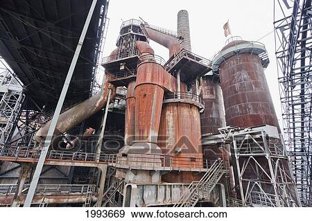 Detail of the blast furnaces at Volklinger Hutte (Volklingen Ironworks), Volklingen, Germany View Large Photo Image Stock Photo - Detail of the blast furnaces at Volklinger Hutte (Volklingen Ironworks), Volklingen, Germany. Fotosearch