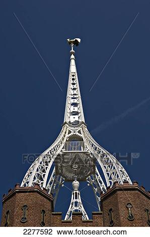 Detail of the cast iron spire on top of the Waterloo Bell Tower, Powell Cotton Museum; Birchington-on-Sea, Kent, England View Large Photo Image Stock Image - Detail of the cast iron spire on top of the Waterloo Bell Tower, Powell Cotton Museum; Birchington-on-Sea, Kent, England. Fotosearch