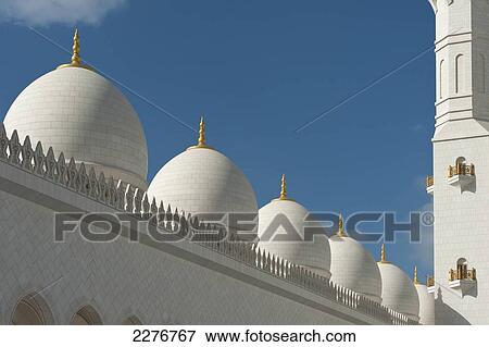 Detail of the domes and minaret of the Sheikh Zayed Grand Mosque; Abu Dhabi, United Arab Emirates View Large Photo Image Stock Photo - Detail of the domes and minaret of the Sheikh Zayed Grand Mosque; Abu Dhabi, United Arab Emirates. Fotosearch