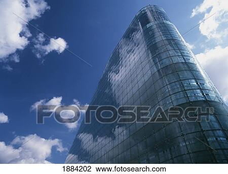Detail Of The Urbis Building With Clouds And Blue Sky Reflections, Close Up View Large Photo Image Stock Image - Detail Of The Urbis Building With Clouds And Blue Sky Reflections, Close Up. Fotosearch