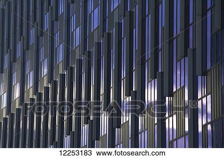 Stock Image - Detailed facade of 6 Mitre Passage, office building, Greenwich Peninsula; London, England. Fotosearch