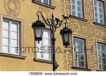 Stock Photo - Detailed facades on burgher houses in Zamkowy Square (Plac Zamkowy) which were rebuilt after the Second World War and now form the UNESCO World Heritage Site Old Town district of Warsaw, Poland. Fotosearch