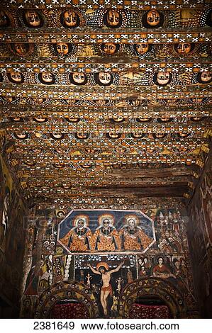 Stock Photo - Details of the painted ceiling and walls in Debre Berhan Selassie church; Gondar, Amhara region, Ethiopia. Fotosearch