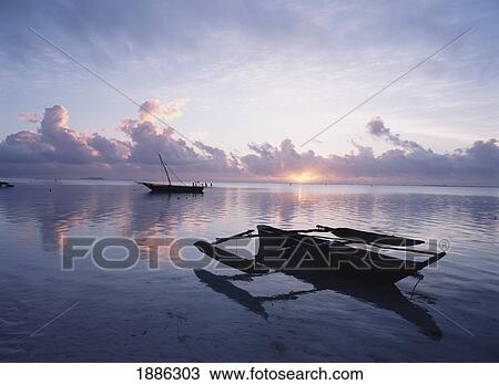 Dhows In Calm Waters At Low Tide At Dawn View Large Photo Image Stock Image - Dhows In Calm Waters At Low Tide At Dawn. Fotosearch