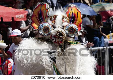 Stock Image - Diablada Dancer Wearing An Elaborate Devil Mask And Costume In The Procession Of The Carnaval De Oruro, Oruro, Bolivia. Fotosearch