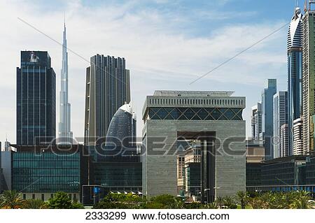Difc (Dubai International Financial Centre) Building With Burj Khalifa In Background; Dubai, United Arab Emirates View Large Photo Image Stock Photo - Difc (Dubai International Financial Centre) Building With Burj Khalifa In Background; Dubai, United Arab Emirates. Fotosearch