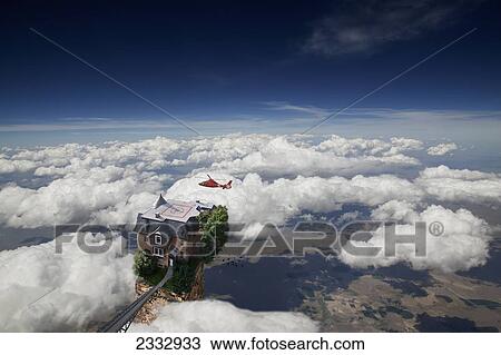 Digital Composite Of Helicopter Flying Through The Clouds Over A House View Large Photo Image Stock Image - Digital Composite Of Helicopter Flying Through The Clouds Over A House. Fotosearch