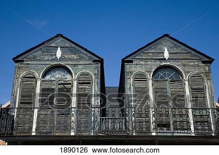 Stock Photograph - Dilapidated Turrets Sprouting From Roof With Faded Paint. Fotosearch