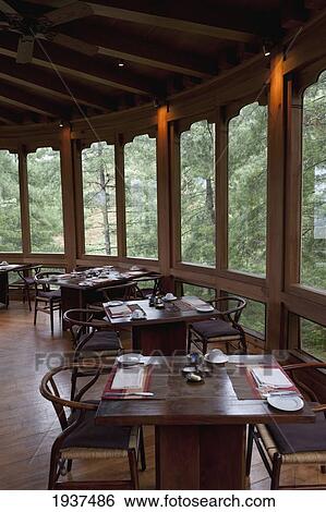Stock Photograph - Dining Room In Uma Paro Hotel; Paro District Bhutan. Fotosearch