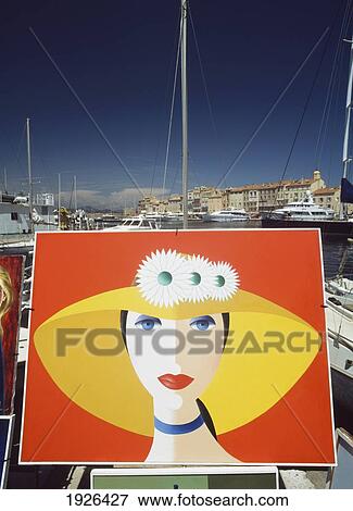 Display of paintings in harbour, St Tropez, France View Large Photo Image Stock Photo - Display of paintings in harbour, St Tropez, France. Fotosearch