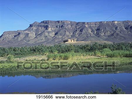 Stock Photograph - Distant View Of House In Draa Valley. Fotosearch