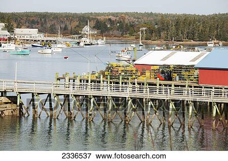 Stock Photo - Docks And Crab Cages At The Water's Edge; Belfast, Maine, United States Of America. Fotosearch