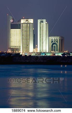 Doha Bay Waterfront Skyline At Dusk. View Large Photo Image Picture - Doha Bay Waterfront Skyline At Dusk.. Fotosearch