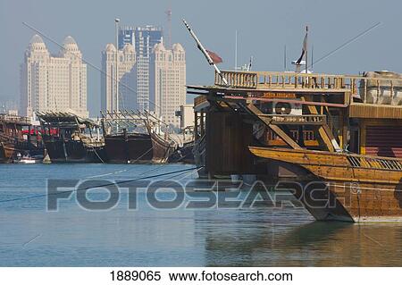 Stock Photography - Doha, Harbour With Dhows (Traditional Arabic Boats) And Skyline.. Fotosearch