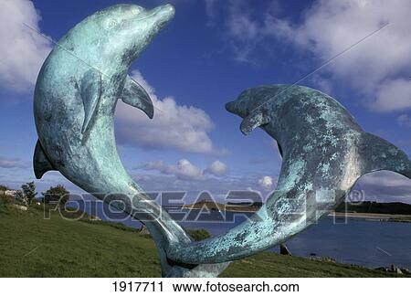 Stock Image - Dolphin Sculpture, Tresco. Fotosearch
