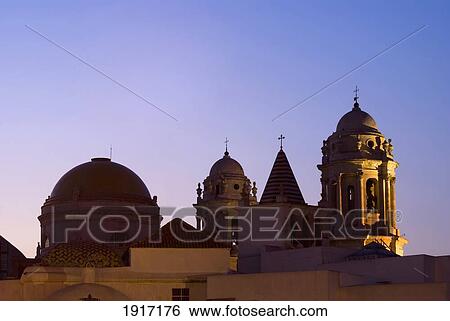 Stock Photograph - Dome And Towers Of Cathedral At Sunset. Fotosearch