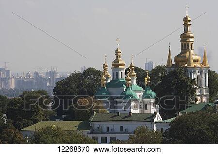 Domes of the Farther Caves at the Pecherska Lavra and high-rise housing under construction in the distance; Kiev, Ukraine View Large Photo Image Stock Image - Domes of the Farther Caves at the Pecherska Lavra and high-rise housing under construction in the distance; Kiev, Ukraine. Fotosearch