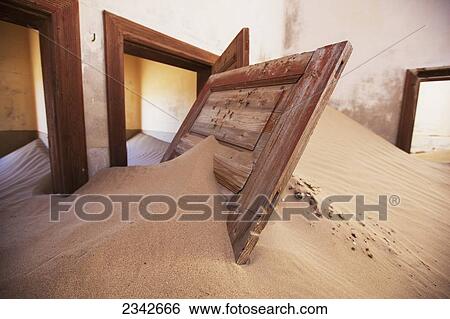 Stock Photograph - Door In Sand Dune; Kolmanskop Ghost Town, Namibia. Fotosearch