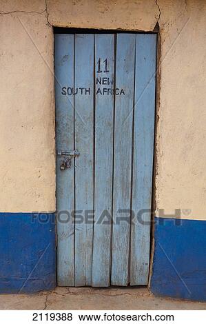 Stock Photo - Door of room in cheap hotel; Kenya. Fotosearch