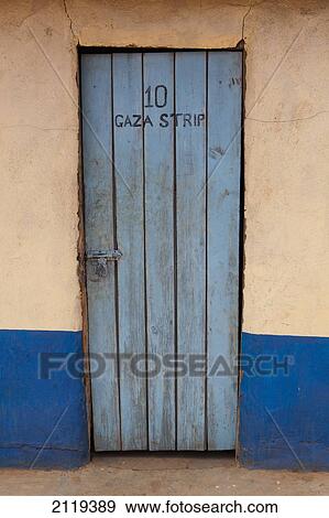 Stock Photo - Door of room in cheap hotel; Kenya. Fotosearch