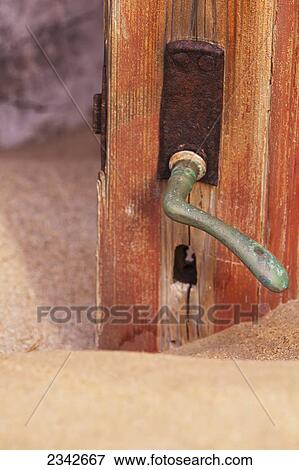 Doorknob And Sand; Kolmanskop Ghost Town, Namibia View Large Photo Image Stock Photo - Doorknob And Sand; Kolmanskop Ghost Town, Namibia. Fotosearch