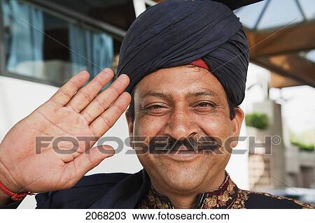 Stock Image - Doorman At The Vasant Continental Hotel, Delhi, India. Fotosearch