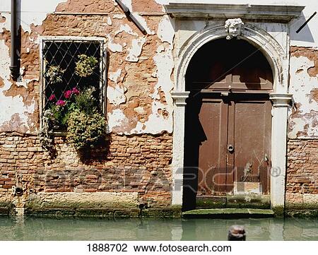 Stock Image - Doorway And Canal. Fotosearch