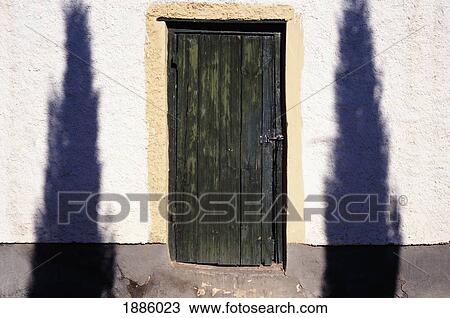 Doorway With Shadows Of Two Trees View Large Photo Image Stock Image - Doorway With Shadows Of Two Trees. Fotosearch