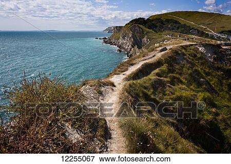 Stock Photo - Dorset coastline at Lulworth Cove; Dorset, England. Fotosearch