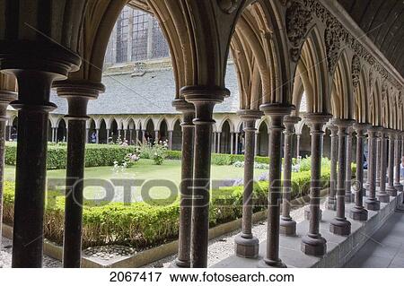 Stock Photo - Double Colonnade Surrounding The Garden Of The Cloister Of The Abbey Of Mont-Saint-Michel, France. Fotosearch