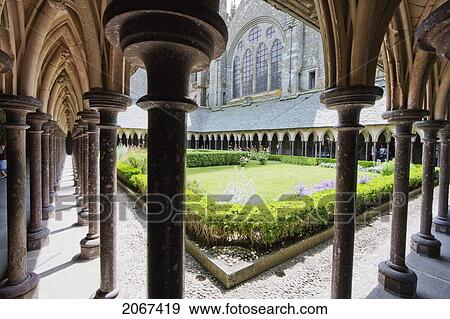 Stock Photo - Double Colonnade Surrounding The Garden Of The Cloister Of The Abbey Of Mont-Saint-Michel, France. Fotosearch