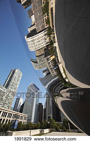 Stock Photo - Downtown Buildings Reflecting In 'cloud Gate' (The Bean) Sculpture. Fotosearch
