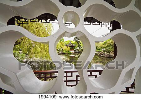 Stock Photo - Dr. Sun Yat-Sen Park, As Seen From A Wall In Dr. Sun Yat-Sen Classical Chinese Garden In Chinatown, Vancouver, British Columbia, Canada. Fotosearch