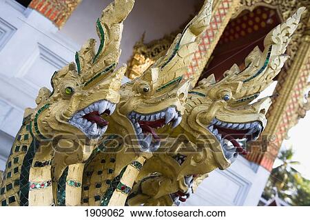 Dragon Statue At Buddhist Temple, Luang Prabang, Laos View Large Photo Image Stock Image - Dragon Statue At Buddhist Temple, Luang Prabang, Laos. Fotosearch