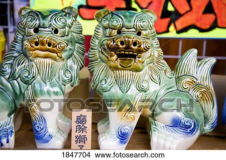Picture - Dragon Statues In Store On Kokusai Street; Naha City, Okinawa Island, Japan. Fotosearch