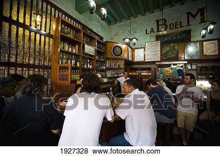 Stock Photo - Drinking In La Bodeguita Del Medio. Fotosearch