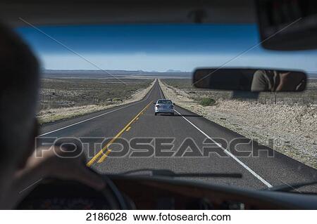 Driving Along The Freeway From Alpine To Chisos Basin In The Big Bend National Park, Texas, Usa View Large Photo Image Stock Photo - Driving Along The Freeway From Alpine To Chisos Basin In The Big Bend National Park, Texas, Usa. Fotosearch