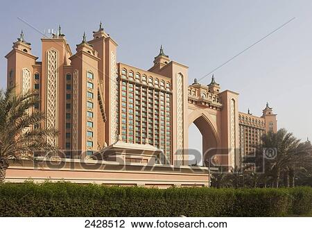 Dubai Atlantis Hotel Palm with blue sky and palm trees; Dubai, United Arab Emirates View Large Photo Image Stock Image - Dubai Atlantis Hotel Palm with blue sky and palm trees; Dubai, United Arab Emirates. Fotosearch