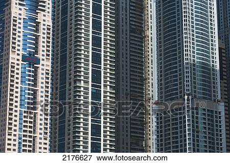 Dubai Marina, Dubai, Uae. Tall Residential And Office Blocks In Dubai Marina View Large Photo Image Stock Photo - Dubai Marina, Dubai, Uae. Tall Residential And Office Blocks In Dubai Marina. Fotosearch