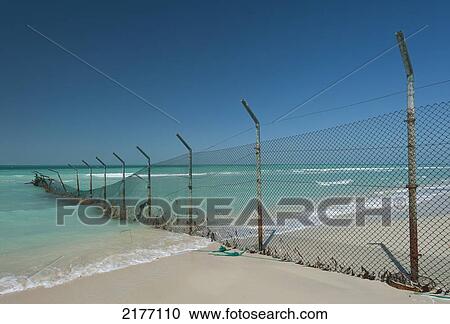 Stock Image - Dubai, Uaefenced Off Beach. Fotosearch