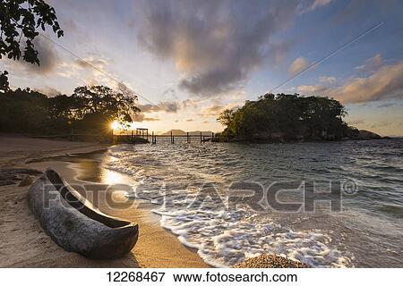 Dugout canoe on small beach on Mumbo Island, Lake Malawi; Malawi View Large Photo Image Stock Photo - Dugout canoe on small beach on Mumbo Island, Lake Malawi; Malawi. Fotosearch
