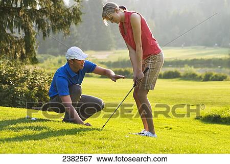 Duncan Savage, golf pro, teaches a lesson at the Whistler Golf Course; Whistler, British Columbia, Canada View Large Photo Image Stock Photo - Duncan Savage, golf pro, teaches a lesson at the Whistler Golf Course; Whistler, British Columbia, Canada. Fotosearch