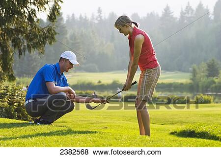 Duncan Savage, golf pro, teaches a lesson at the Whistler Golf Course; Whistler, British Columbia, Canada View Large Photo Image Stock Photo - Duncan Savage, golf pro, teaches a lesson at the Whistler Golf Course; Whistler, British Columbia, Canada. Fotosearch