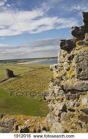 Stock Photograph - Dunstanburgh Castle Walls, Northumberland, England, Uk. Fotosearch