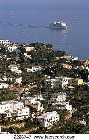 Stock Photo - Early Morning Ferry Arriving With Tourist To Capri, Italy Photo: Jill Mead/Axiom/. Fotosearch
